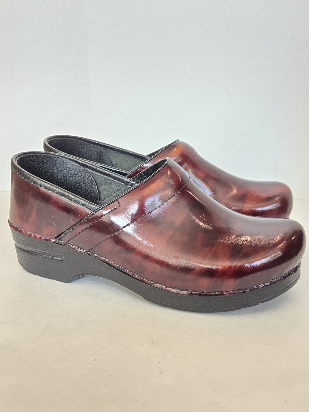 Dansko Women's Glossy Wine Leather Clogs